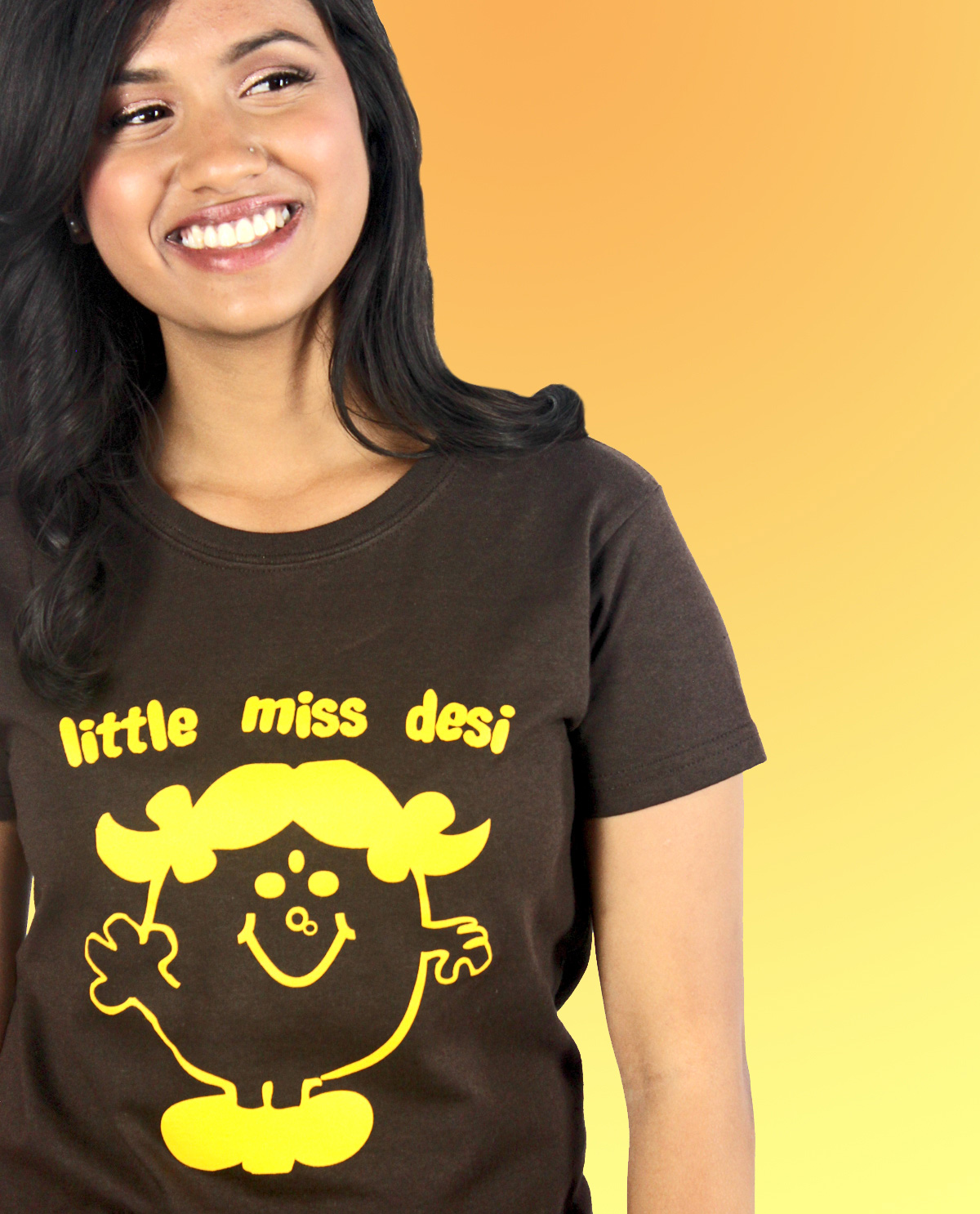 South Asian Female Model wearing Graphic Design T.shirt with Little Miss Desi graphic design on front.